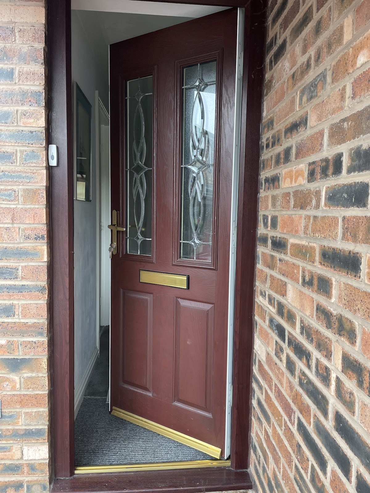 Fire-rated composite door with ironmongery in Manchester property
