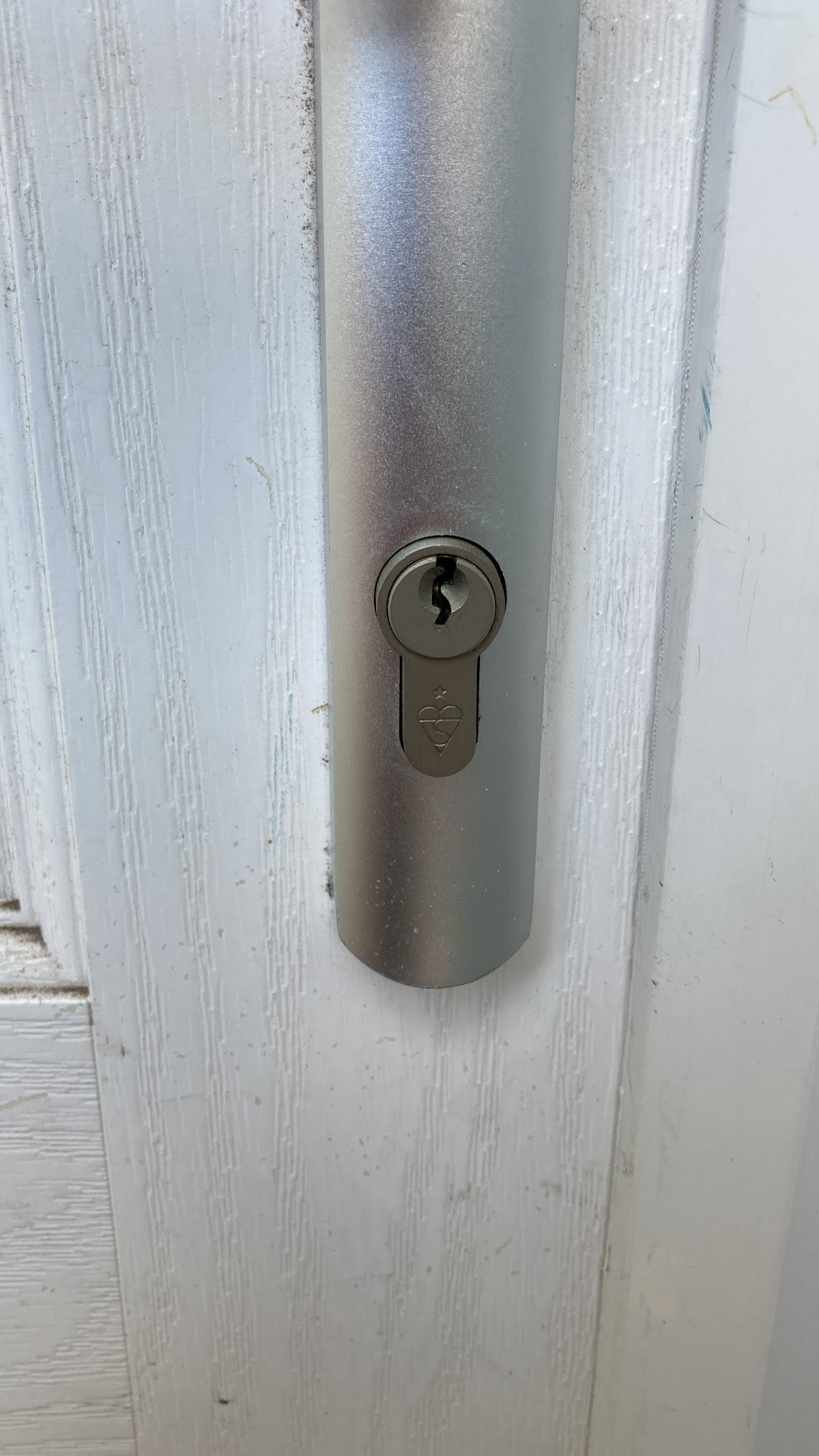 Door being diagnosed and realigned by the Door Doctor in Manchester