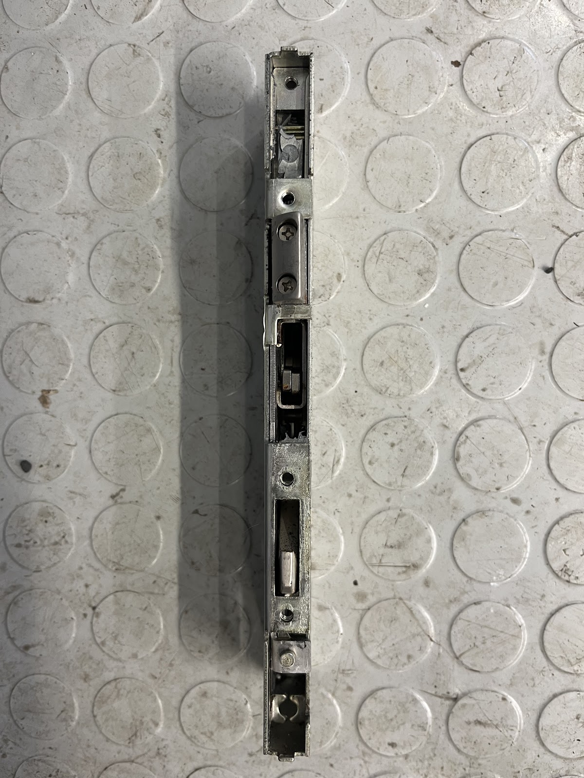 Multi-point door mechanism gearbox being repaired in Manchester