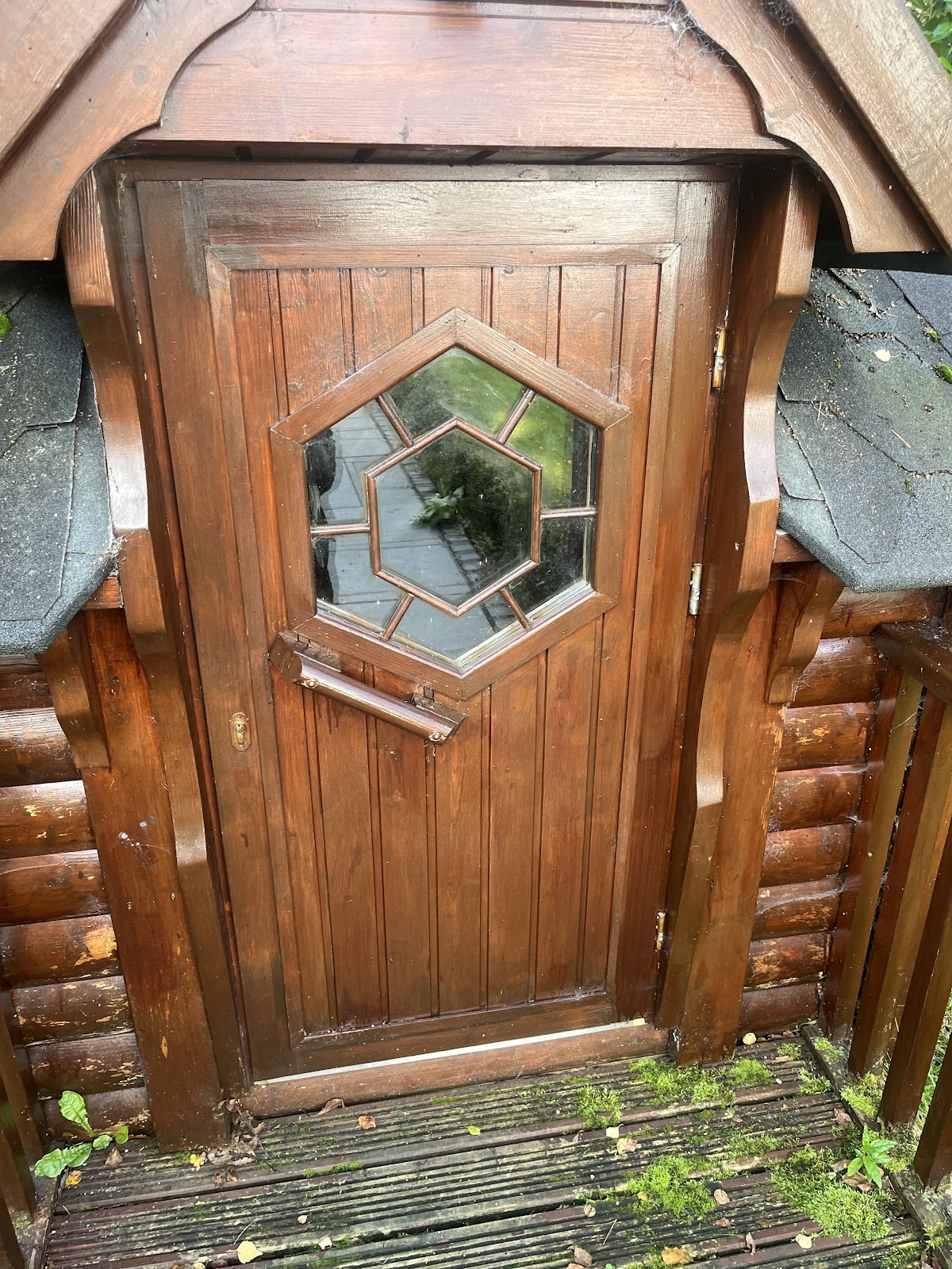 Wooden front door being repaired by MA Door Repairs in Manchester